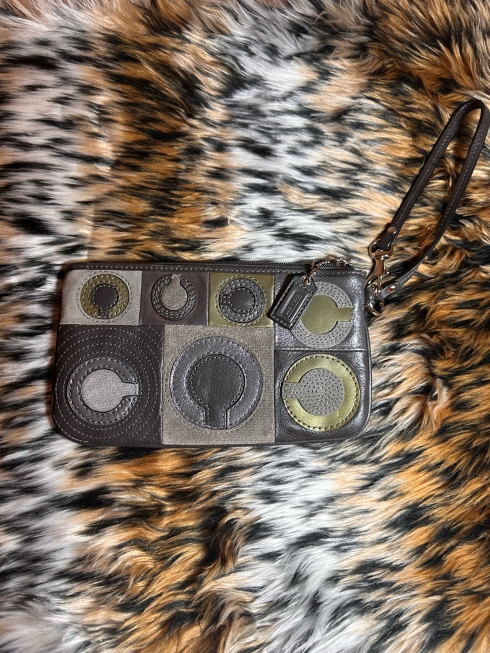 COACH Mia Madison Inlaid Signature C patch work wristlet.